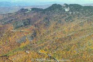 Linn Cove Viaduct on the Blue Ridge Parkway below Grandfather Mountain State Park with Autumn Colors in Western North Carolina Aerial View