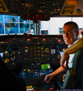 Passenger Plane Cockpit w. Pilot