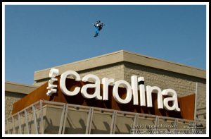 Rocketman Dan Schlund with Rocket Belt Jet Pack Flying Over Carolina Cinemas