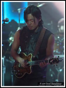 Michael Kang with The String Cheese Incident